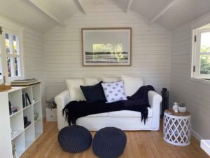 Star Cabin beach whites couch interior