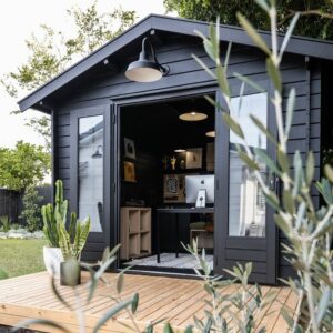 Black outside cabin used as a home office 