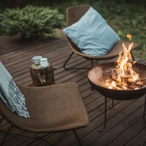 firepit on a timber deck of holiday cabin
